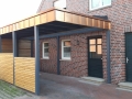 Carport mit Lichtband zum Haus als Flachdachkonstruktion